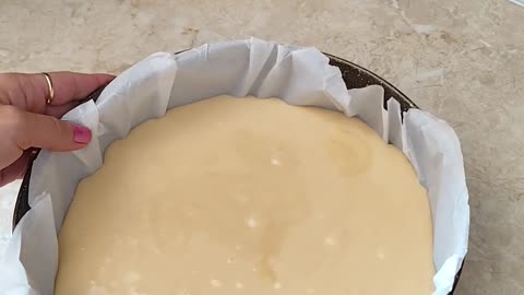 Evenly spreading dough in a form