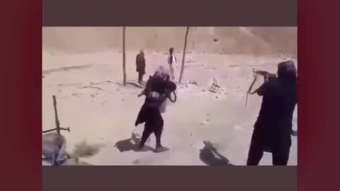 Taliban execute two afghans use them as targets