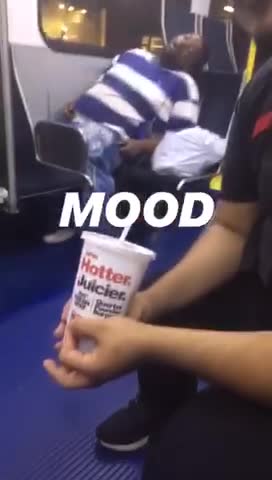 Mood guy blue white stripe shirt sleeping bus