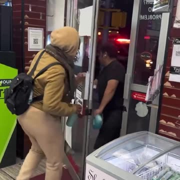 Woman and man work together to keep theif out store