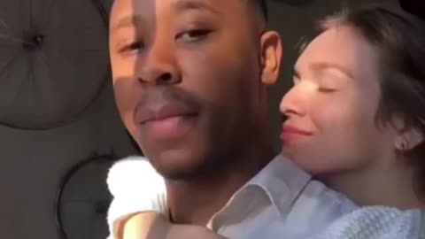 Mixed Couple Stare At Sunset