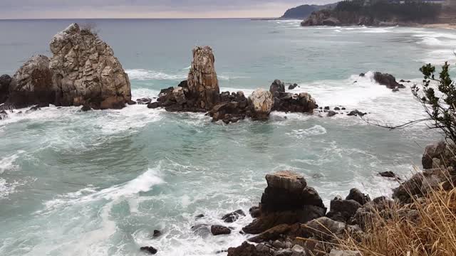 Peaceful scenery of a wavy beach