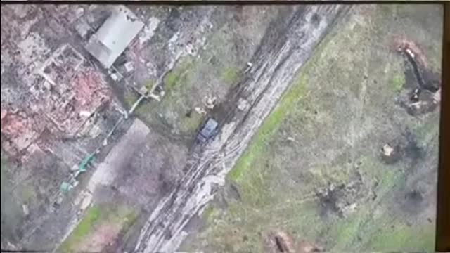 Ukraine Drone Drops Grenade/Bomb on Russian Vehicle - NSFW