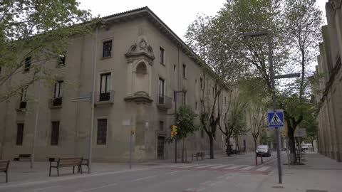 Cars driving down a road in Spain