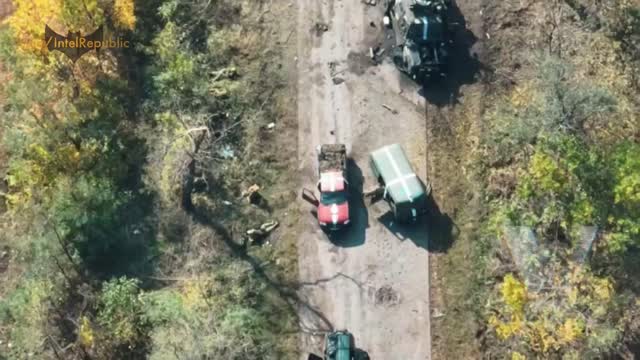 Ukrainian column of military vehicles and equipment LINE UP with no COVER in sight