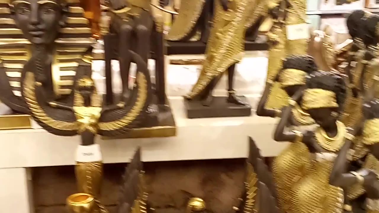 Egyptian statue on store