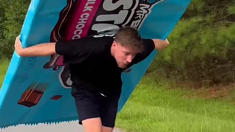 mr beast runing with chocklate