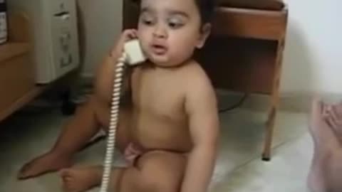 baby talking on the phone