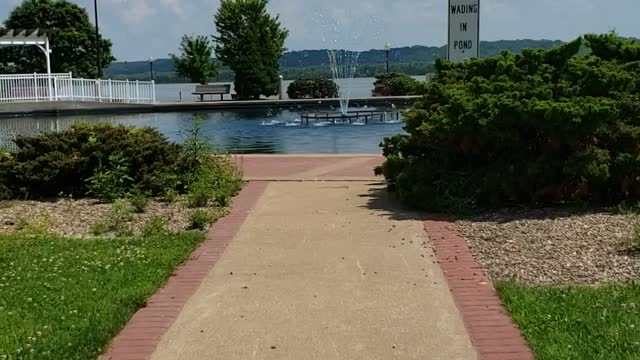 Walking by water fountain