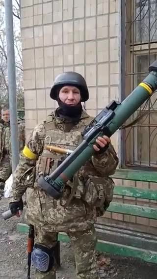 Ukrainian Combatant carrying a Spanish-made Instalaza C-90 grenade launcher