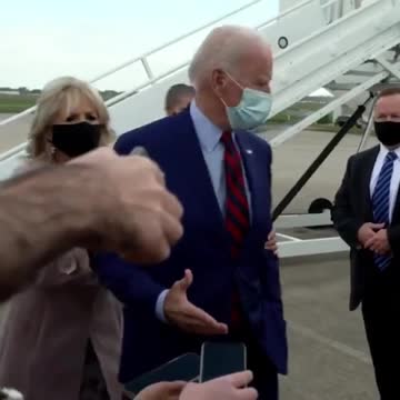 Jill Biden Caught Physically Moving Dementia Patient Joe at Airport Who Is Stuck With Hand Out