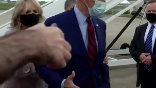 Jill Biden Caught Physically Moving Dementia Patient Joe at Airport Who Is Stuck With Hand Out