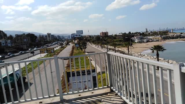 sea and buildings view lebanon-dbayee-over the bridge