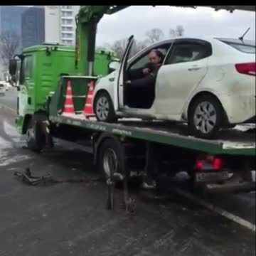 Russian refuses to be towed away