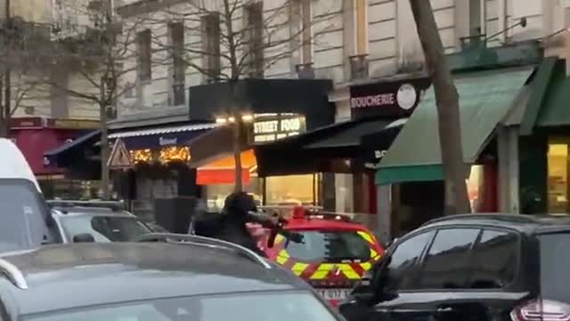 Hostages' situation in Paris man armed with a knife demanding he speaks to the Justice Minister,