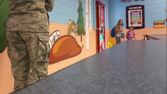 Air Force Mom surprises girls after 6 mo deployment