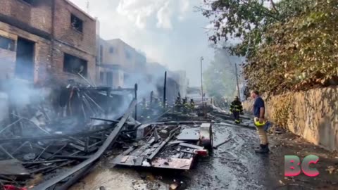 Massive NYC fire engulfs 7 homes; 11 firefighters injured