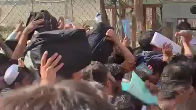 SHOCKING Video Shows Afghans Passing Babies to Front of Line at Airport Checkpoint