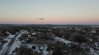 Snowy hill country sunset