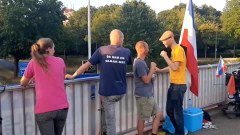 Supporters of farmers convoy wave flags on the Kennedylaan in Eindhoven