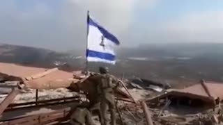 Israel military raises Israel flag in Lebanon.