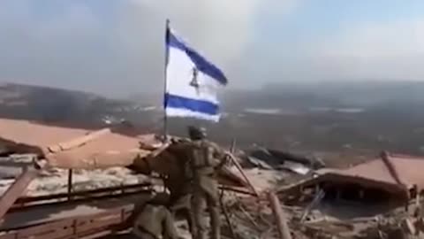 Israel military raises Israel flag in Lebanon.