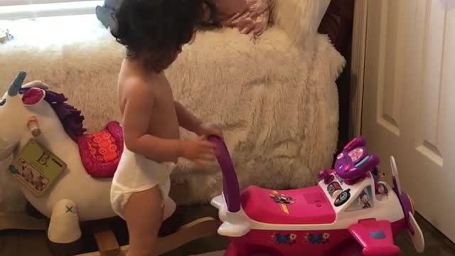 Mila playing in her room again