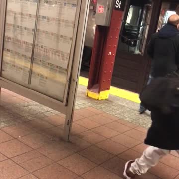 White pants guy dances weird in subway terminal