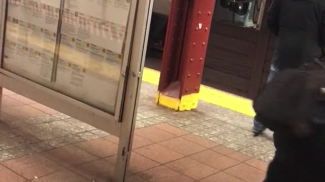 White pants guy dances weird in subway terminal