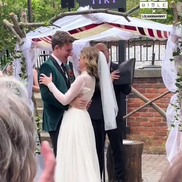 Bride and groom wedding handshake