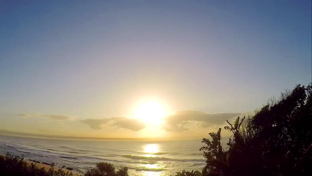 Impressive Time Lapse Of A Sunrise Over Sea Water