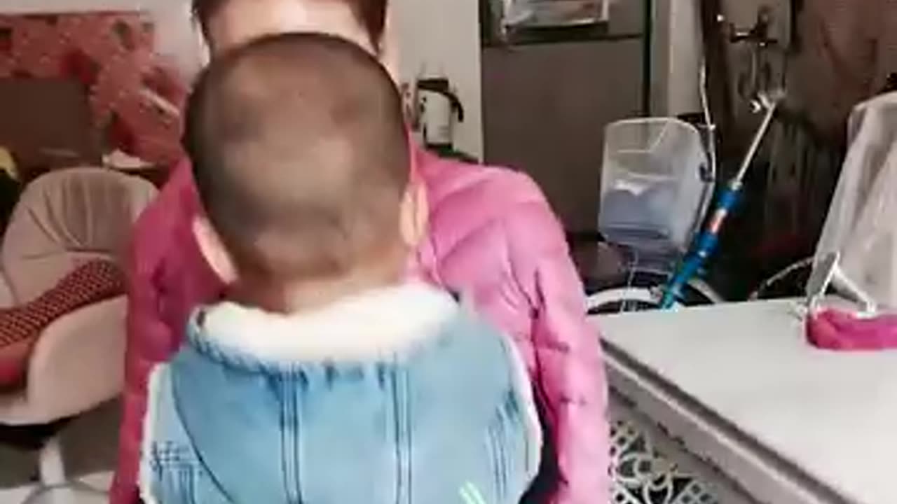 She may be armless, but she takes the best care of her son