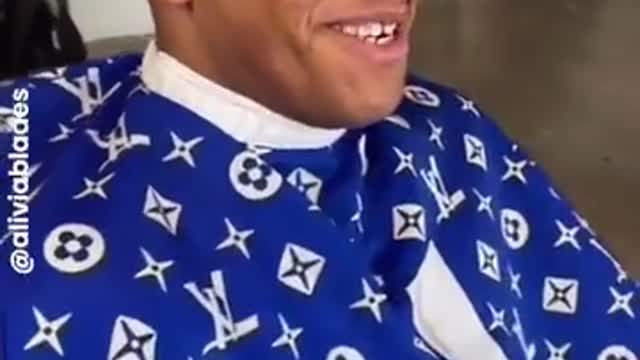 Flirty barber caresses lips