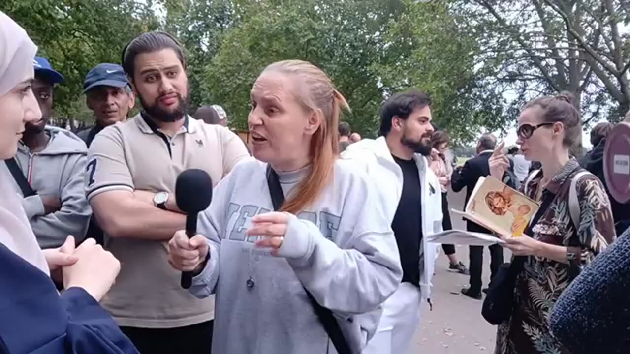 Muslims gather to prevent Muslim Woman from hearing the truth about the real Jes