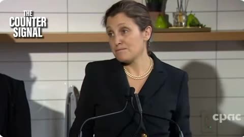 A reporter asks Freeland about the arrest of Rebel News reporter David Menzies.