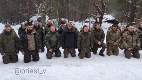 Russian soldiers praying before battle