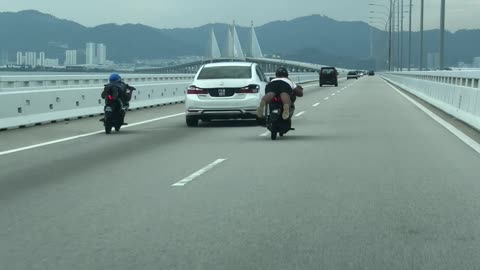 Malaysian Motorists Perform Group Stunt over Penang Bridge