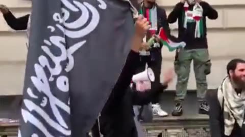 What flag is this "gentleman" waving in London?
