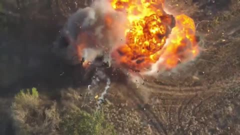 Footage of the simultaneous detonation of two Russian IFVs after being hit by FPV drones