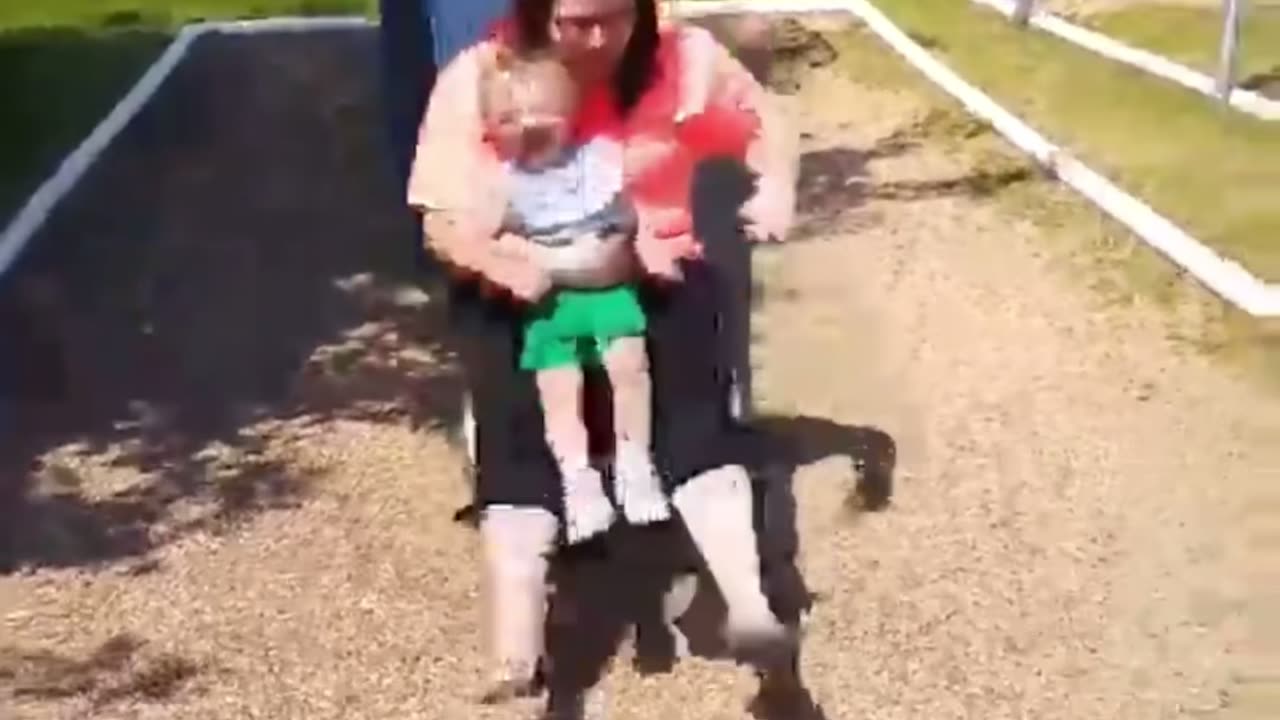 Aunt, toddler nephew fall face-first into the dirt after funny SLIDE FAIL