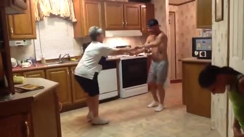 Son Grabs Mom's Hand When Their Favorite Song Comes On, Their Dance Is Lighting Up The Internet