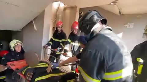 Rescue operation of 7 -year-old girl from the rubble in a 9-story building