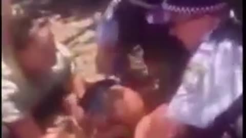 Australian Covid-Tyrants Taking a Crying Infant From a Desperate Mother's Arms