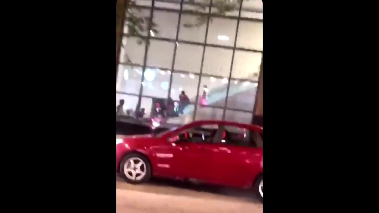 Dozens Of Looters Seen Running In And Out Of Tesla Dealership During Chicago Riots