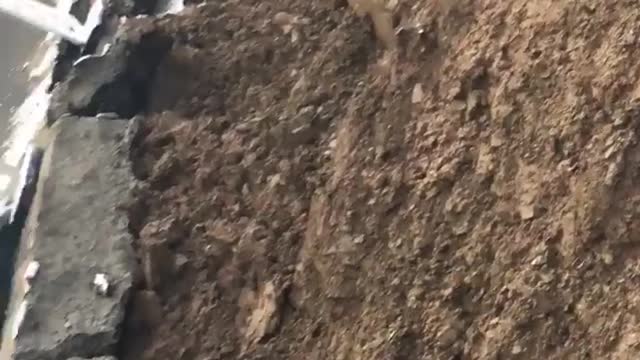 Road Collapses After Landslide