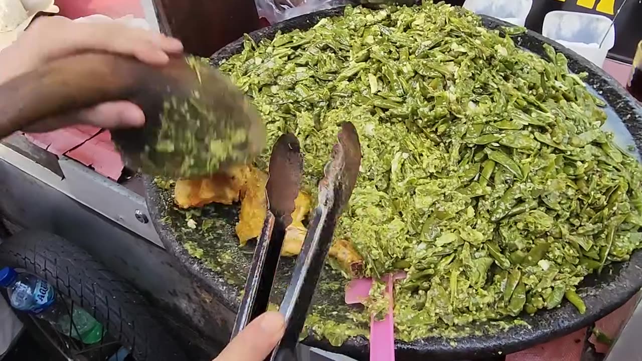 Traditional Ayam Penyet of Indonesia with Mashed Green Chilli