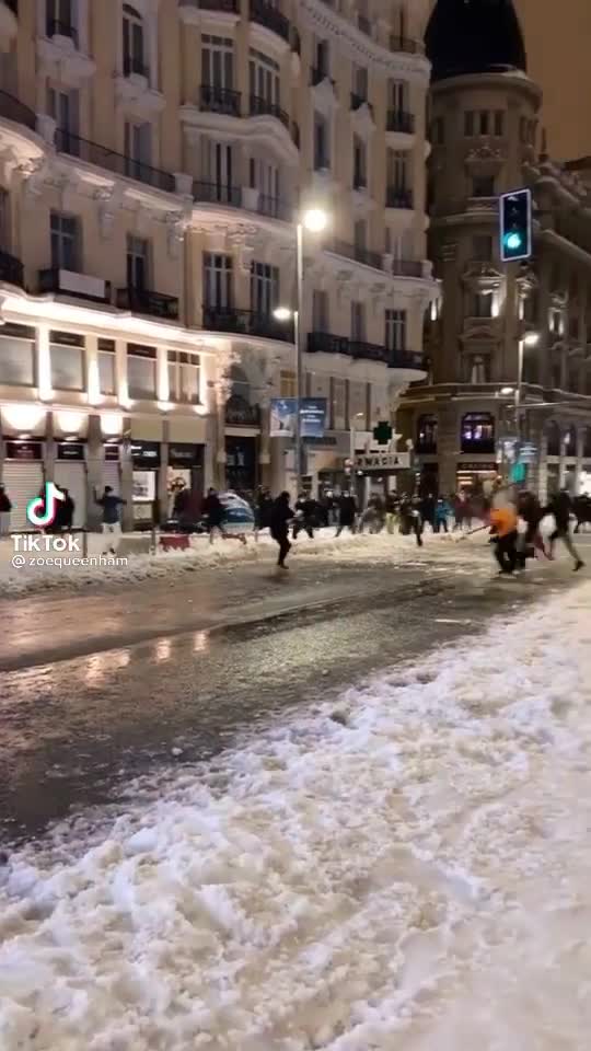 Epic community snowball fight in Madrid, Spain