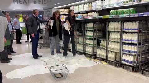 Overgrown children calling themselves "animal rebellion" pouring milk out in Waitrose, Edinburgh