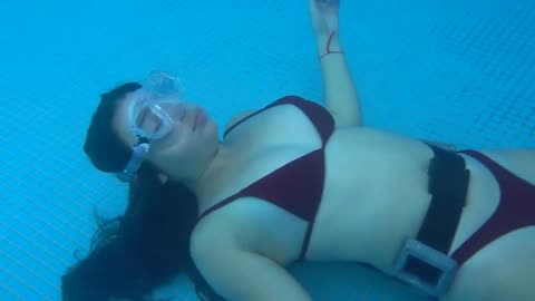 Girl underwater breathhold