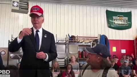 BIDEN Puts on a TRUMP Hat